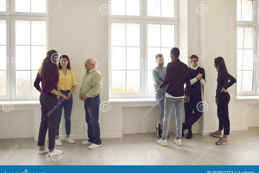 diverse-people-mingling-community-meeting-group-therapy-talking-common-interests-getting-to-know-each-other-207012213